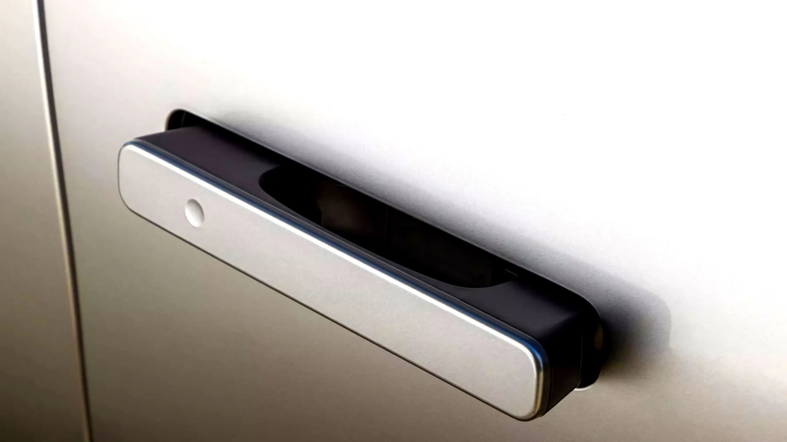 Retractable flush door handle popping out from car body